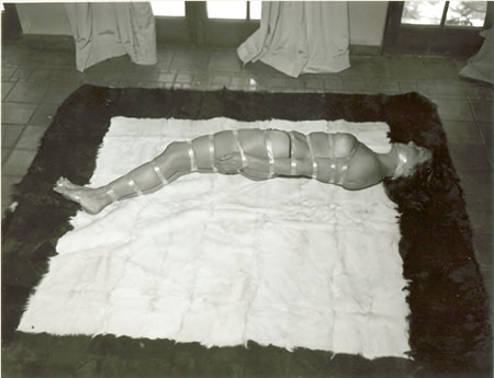 John Willie bondage photo in the Spanish Foyer setting