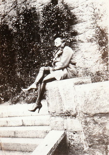 1930s or 1940s photo of woman wearing tall boots